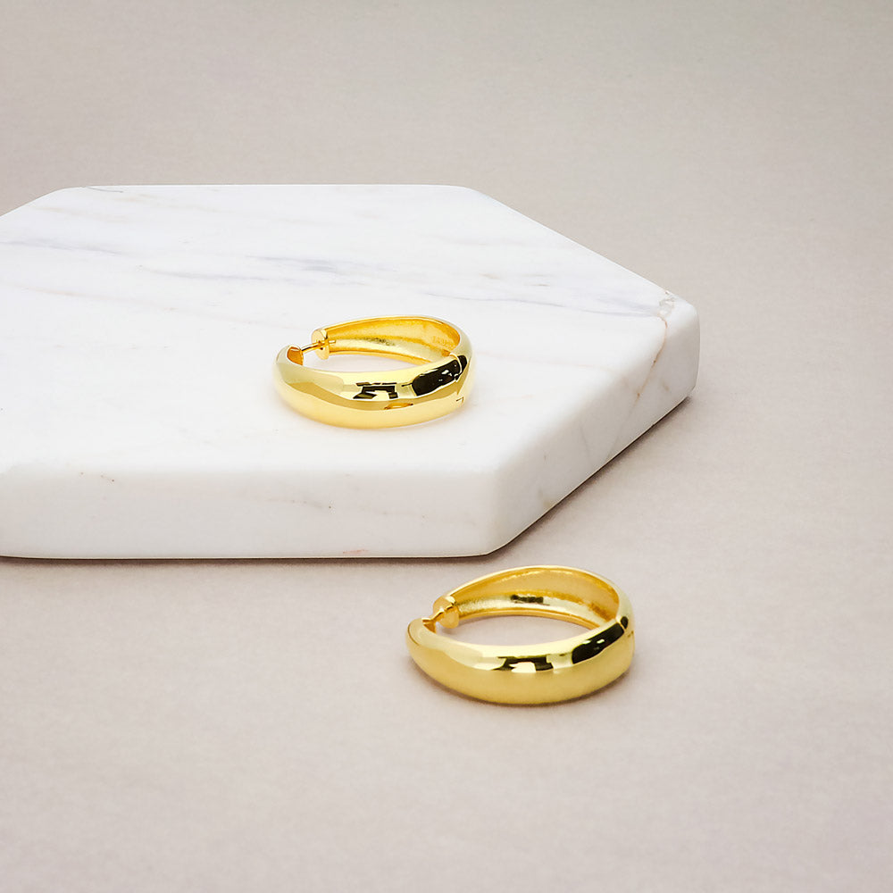 Flatlay view of Dome Small Hoop Earrings in Sterling Silver 0.8-1 inch, 2 Pairs, Yellow Gold Flashed