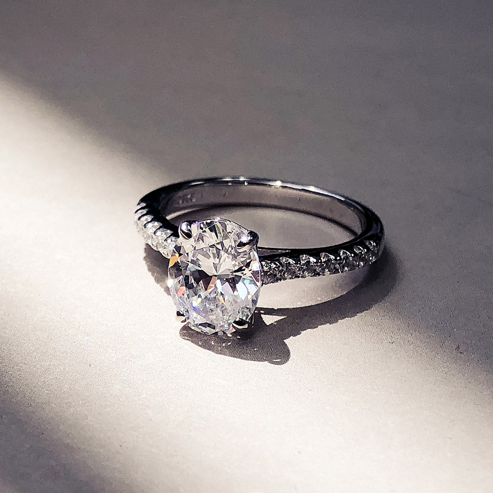 Flatlay view of Solitaire 1.8ct Oval CZ Ring in Sterling Silver, 11 of 12