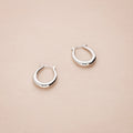 Flatlay view of Oval Small Hoop Earrings 0.9 inch, Gold-Tone