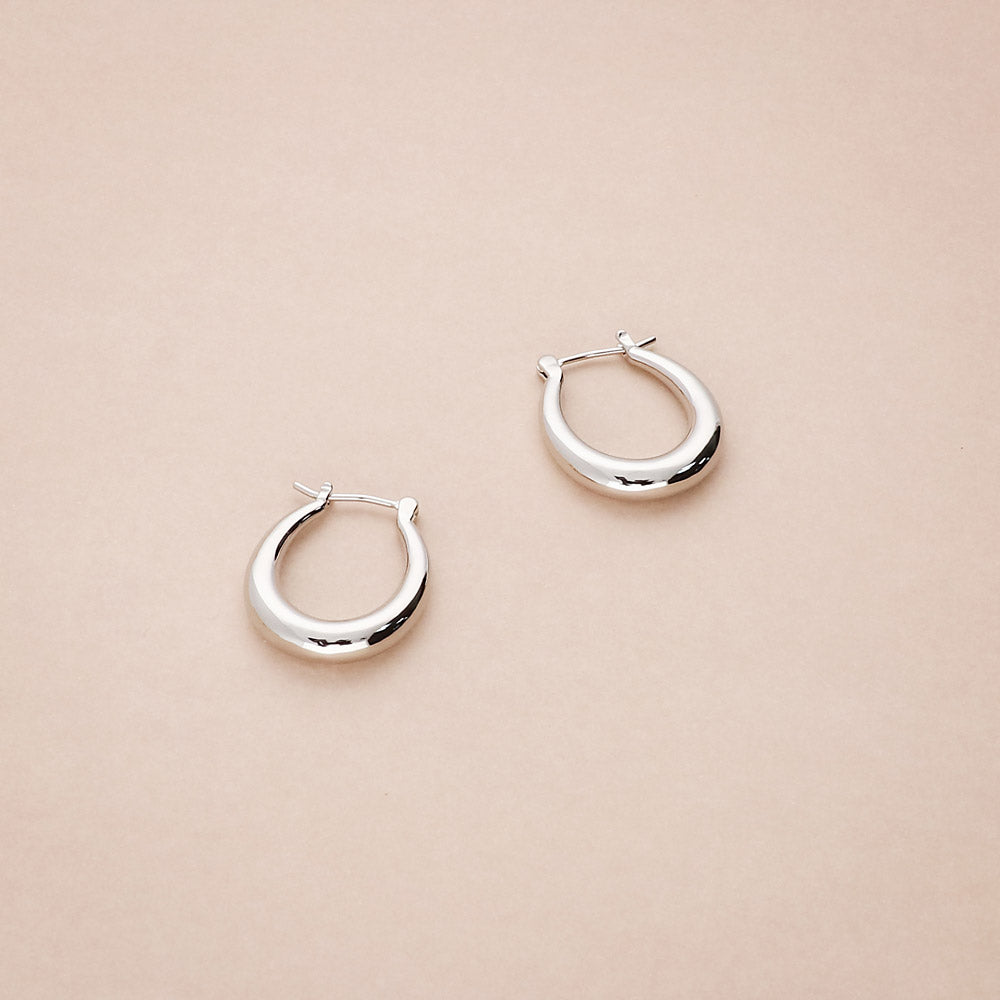 Flatlay view of Oval Small Hoop Earrings 0.9 inch, Gold-Tone
