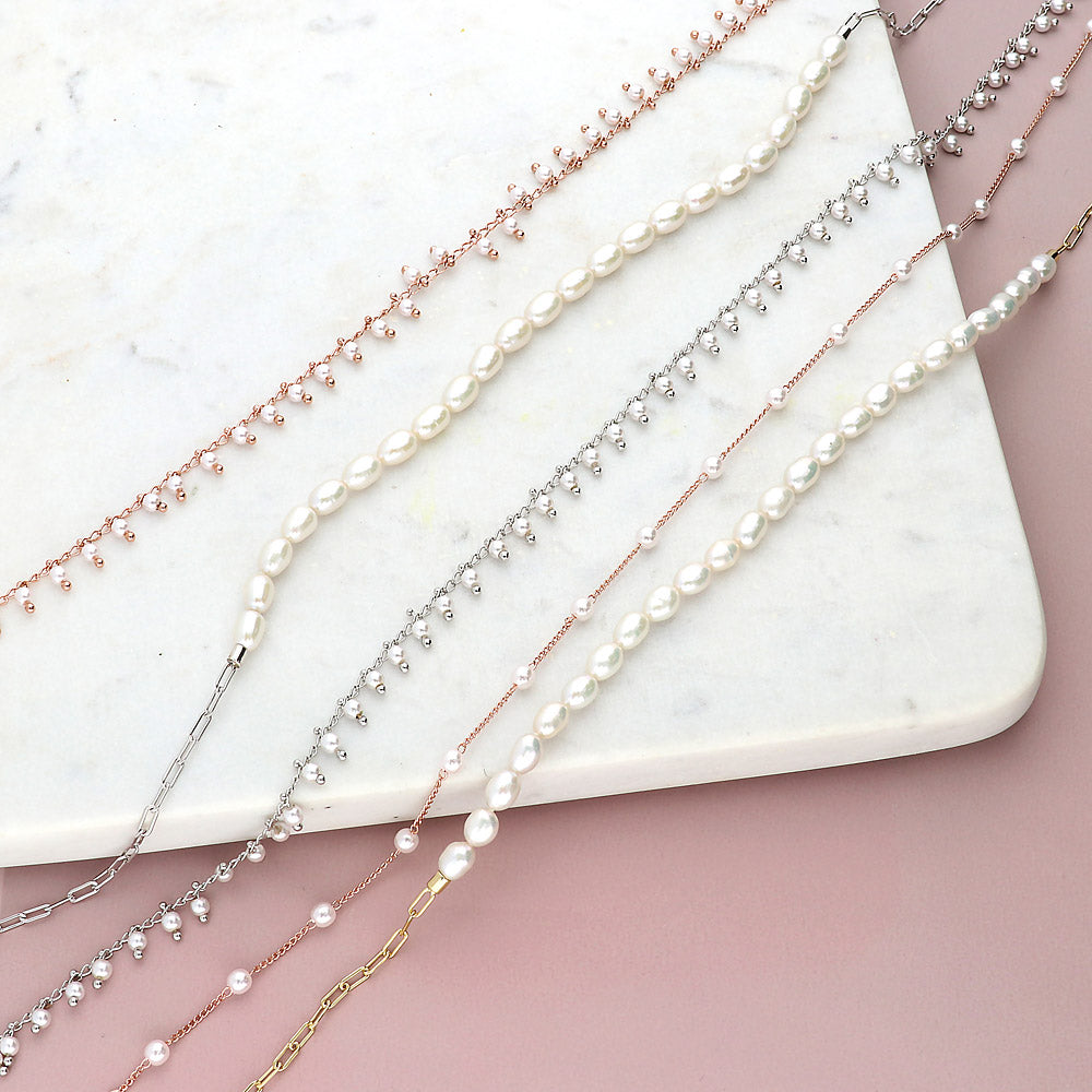 Station Necklace Style N1654-01, Station Necklace Style N1654-03 in Flatlay Display