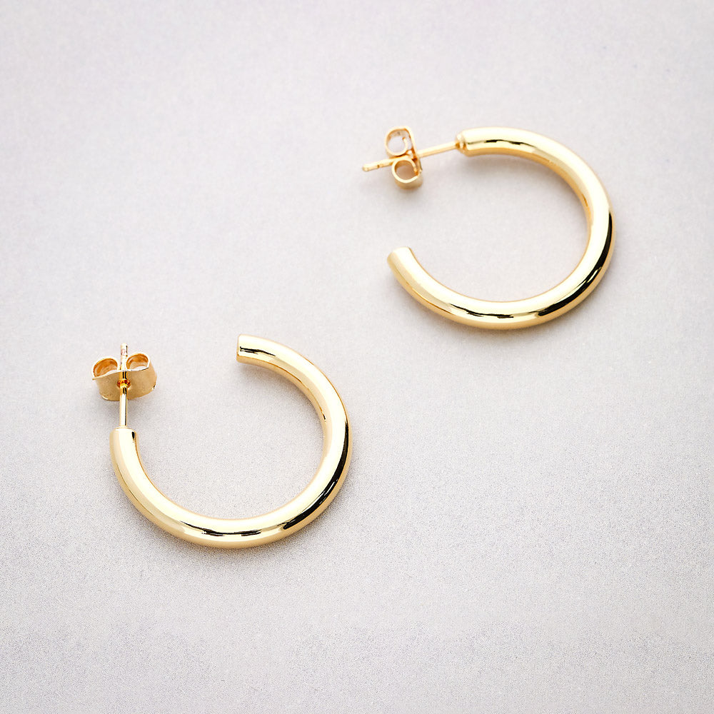 Flatlay view of Small Hoop Earrings, 1 inch, Gold-tone