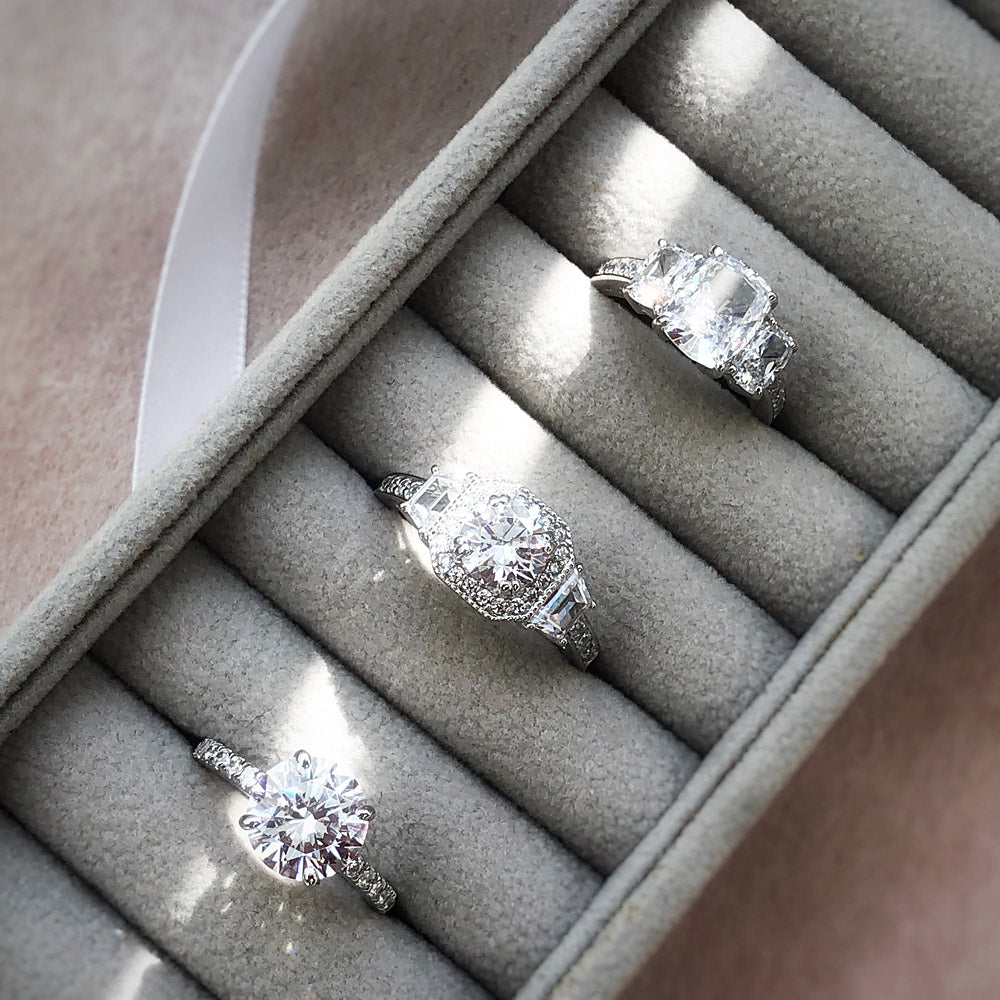 Halo Ring Style R292, Solitaire Ring Style R1350-01 in Flatlay Display