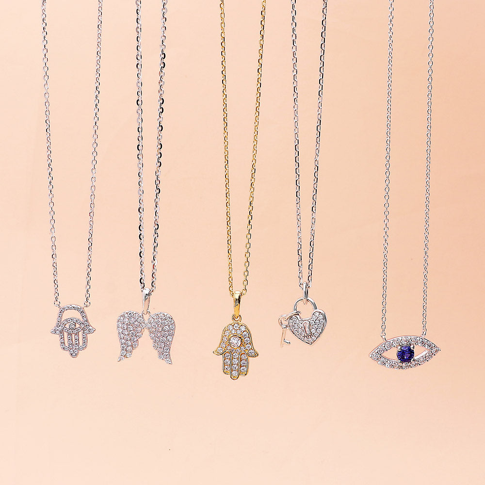 Evil Eye Necklace Style N1365-01, Key and Lock Necklace Style N1441-01 in Flatlay Display