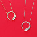 Flatlay view of Snake CZ Pendant Necklace in Sterling Silver