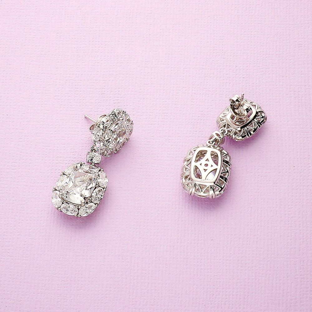 Flatlay view of Halo Cushion CZ Chandelier Earrings in Sterling Silver, 7 of 9