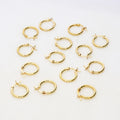 Flatlay view of Small Hoop Earrings in Sterling Silver 0.6 inch, Yellow Gold Flashed