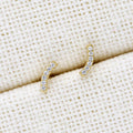 Flatlay view of Bar CZ Stud Earrings in Sterling Silver, Yellow Gold Flashed