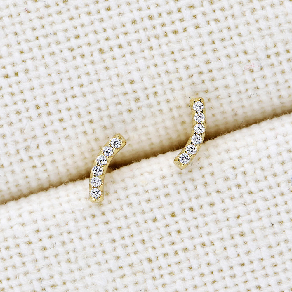 Flatlay view of Bar CZ Stud Earrings in Sterling Silver, Yellow Gold Flashed