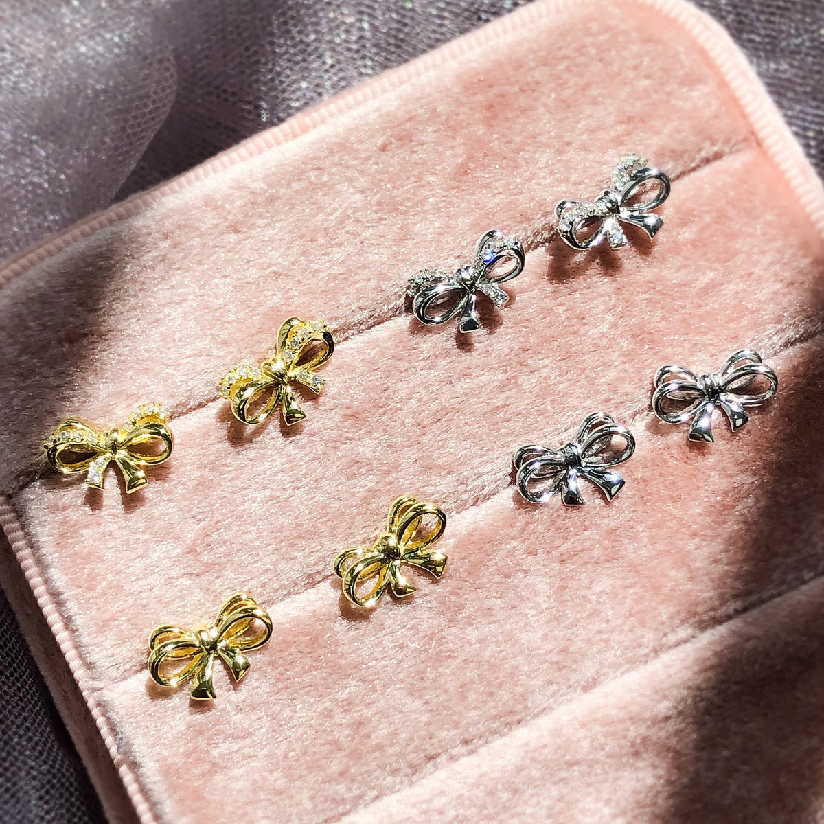 Bow Tie Stud Earrings Style E1698-01, Bow Tie Stud Earrings Style E1698-02 in Flatlay Display