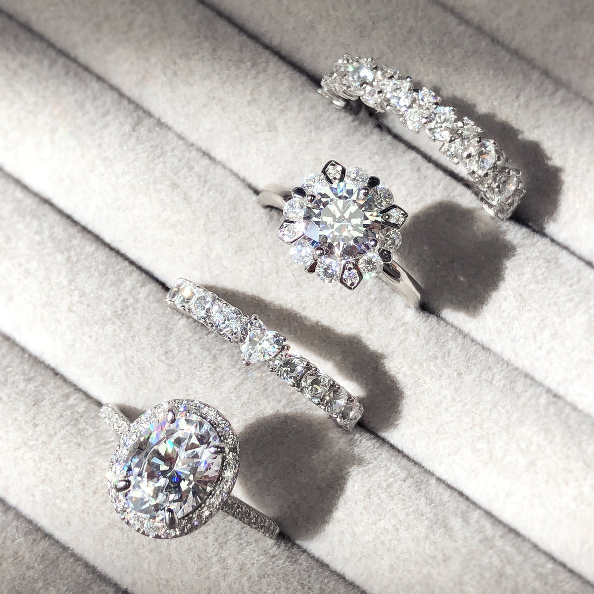 Eternity Ring Style R1879-01, Halo Ring Style R1753-01 in Flatlay Display