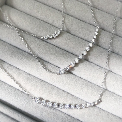 Cluster Necklace Style N1617-01, Graduated Necklace Style N1581-01 in Flatlay Display