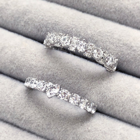 Eternity Ring Style R1879-01, Solitaire Ring Style R1880-01 in Flatlay Display