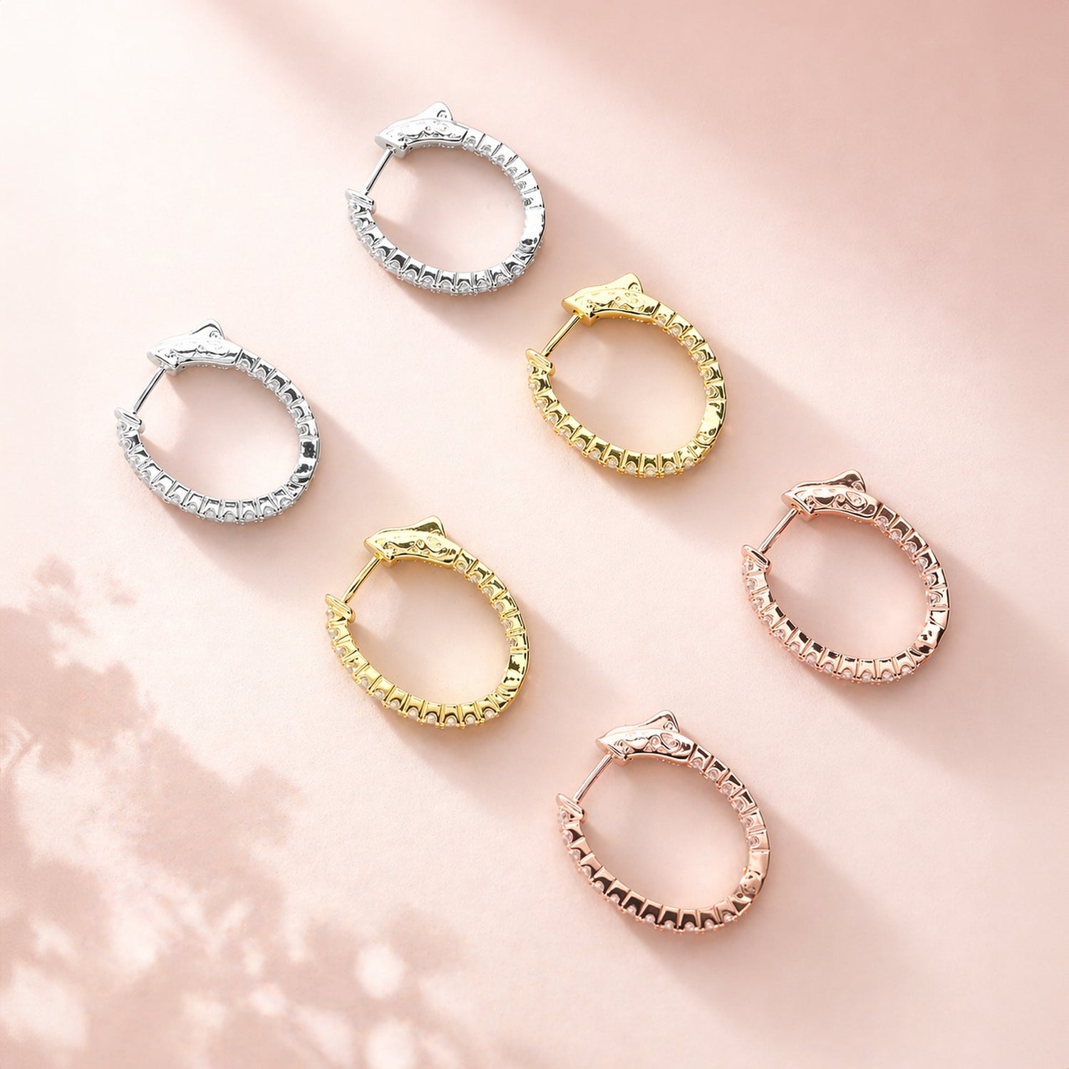 Angle view of Oval CZ Small Inside-Out Hoop Earrings in Sterling Silver 0.8 inch