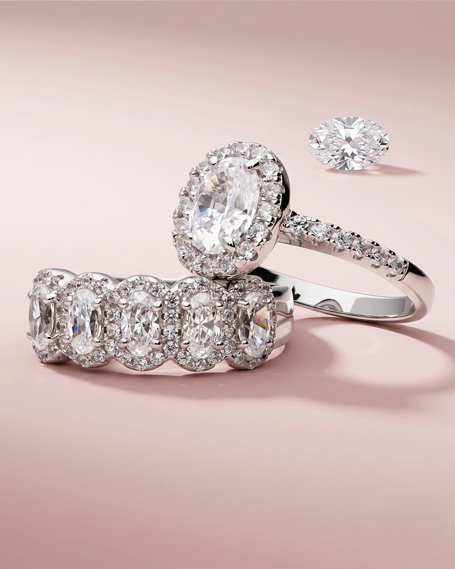 Silver rings on soft pink background
