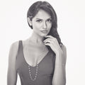 Model wearing Solitaire Bezel CZ Stud Earrings in Gold Flashed Sterling Silver, Rhodium Plated, Clear / 7mm