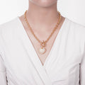 Model wearing Heart CZ Toggle Necklace, Gold-Tone / 18 Inch
