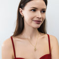 Model wearing Snake CZ Stud Earrings in Sterling Silver, Gold Flashed