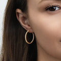 Model wearing CZ Hoop Earrings in Gold Flashed Sterling Silver 0.9-1 inch, 2 Pairs, 2-Pair Set, 1 inch