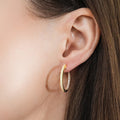 Model wearing CZ Hoop Earrings in Gold Flashed Sterling Silver 0.9-1 inch, 2 Pairs, 2-Pair Set, 0.9 inch