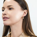 Model wearing Solitaire Emerald Cut CZ Leverback Earrings in Sterling Silver, Gold Plated