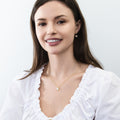 Model wearing Solitaire 1.25ct Bezel CZ Necklace in Sterling Silver, Gold Flashed