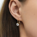 Model wearing Solitaire CZ Leverback Earrings in Sterling Silver, Gold Flashed / 6mm