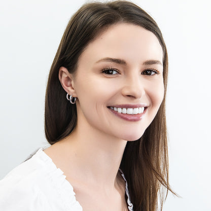 Model Wearing 7-Stone Hoop Earrings Style E1585-01, Woven Hoop Earrings Style E1892-01
