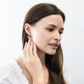 Model wearing Solitaire CZ Leverback Earrings in Sterling Silver, Rhodium Plated / 5mm
