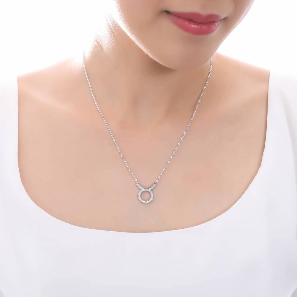 Model wearing Zodiac CZ Pendant Necklace in Sterling Silver, Taurus
