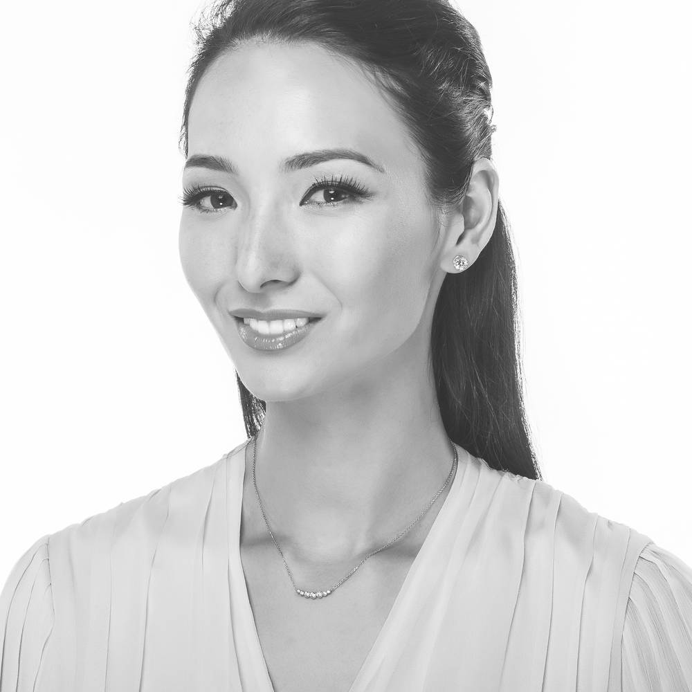 Model wearing Graduated Bubble Bar CZ Necklace in Sterling Silver, Rhodium Plated