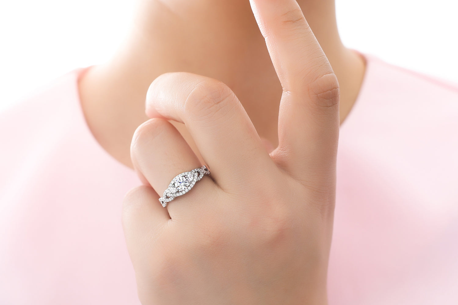 6. Woven Twisted 3-Stone Engagement Ring