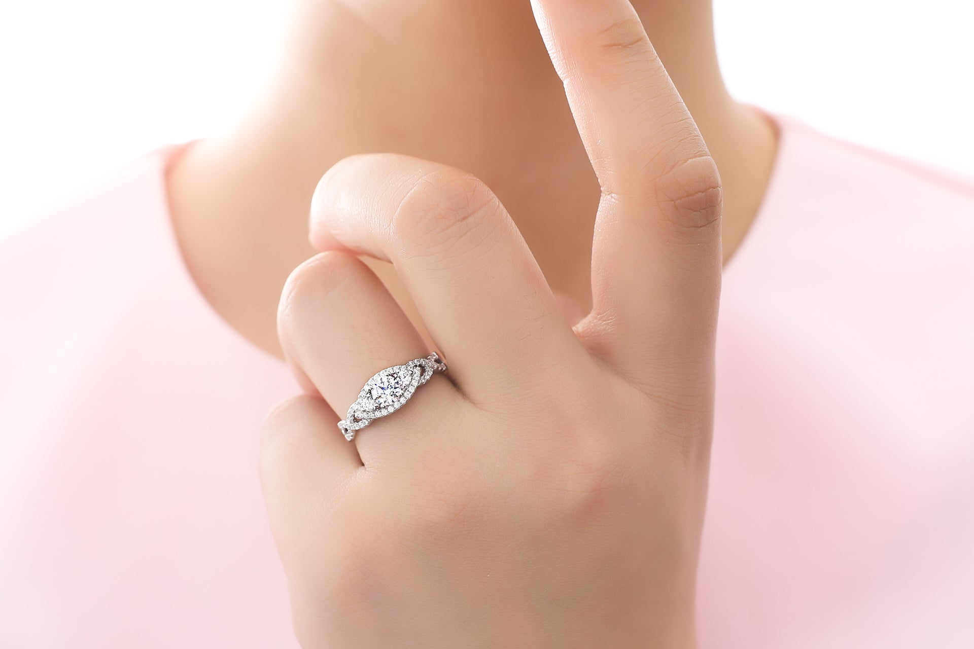 6. Woven Twisted 3-Stone Engagement Ring
