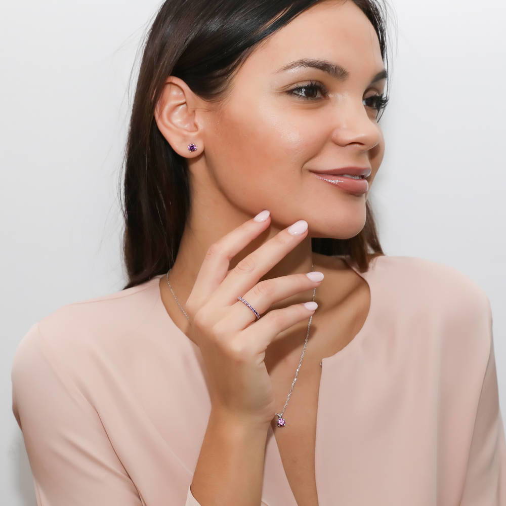 Model wearing Solitaire CZ Necklace in Sterling Silver, Round Cut / Purple