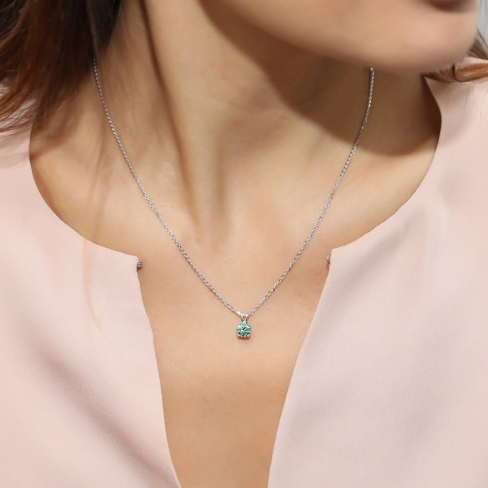 Model wearing Solitaire CZ Necklace in Sterling Silver, Round Cut / Green