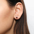 Model wearing Solitaire 1.6ct CZ Cartilage Stud Earrings in Sterling Silver, Caramel