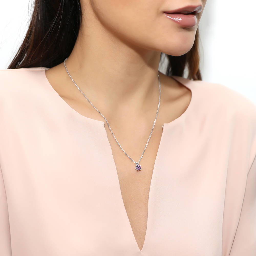 Model wearing Solitaire CZ Necklace in Sterling Silver, Round Cut / Purple