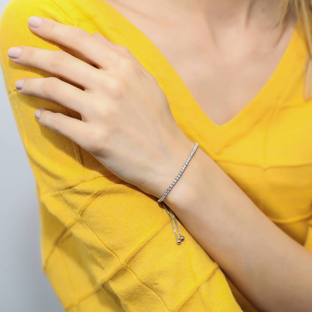 Model wearing CZ Tennis Bracelet Gold Flashed, Clear Color