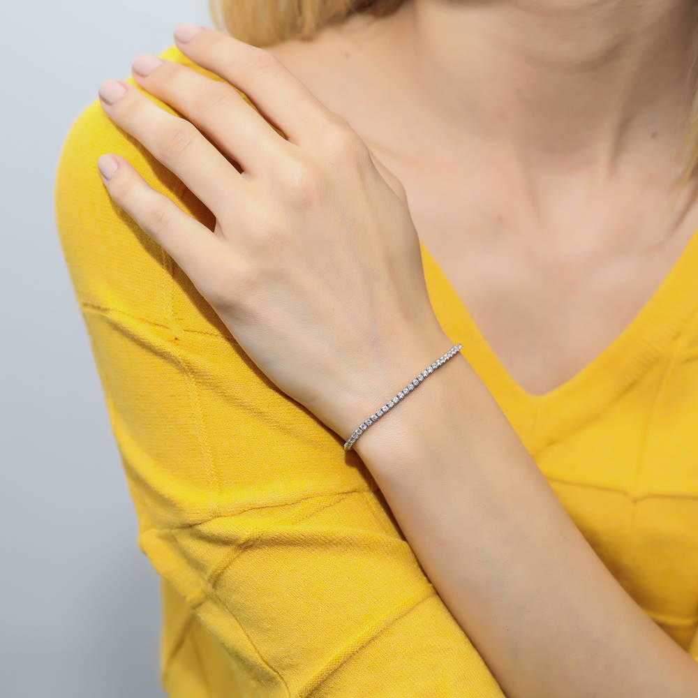 Model wearing CZ Tennis Bracelet Gold Flashed, Clear Color