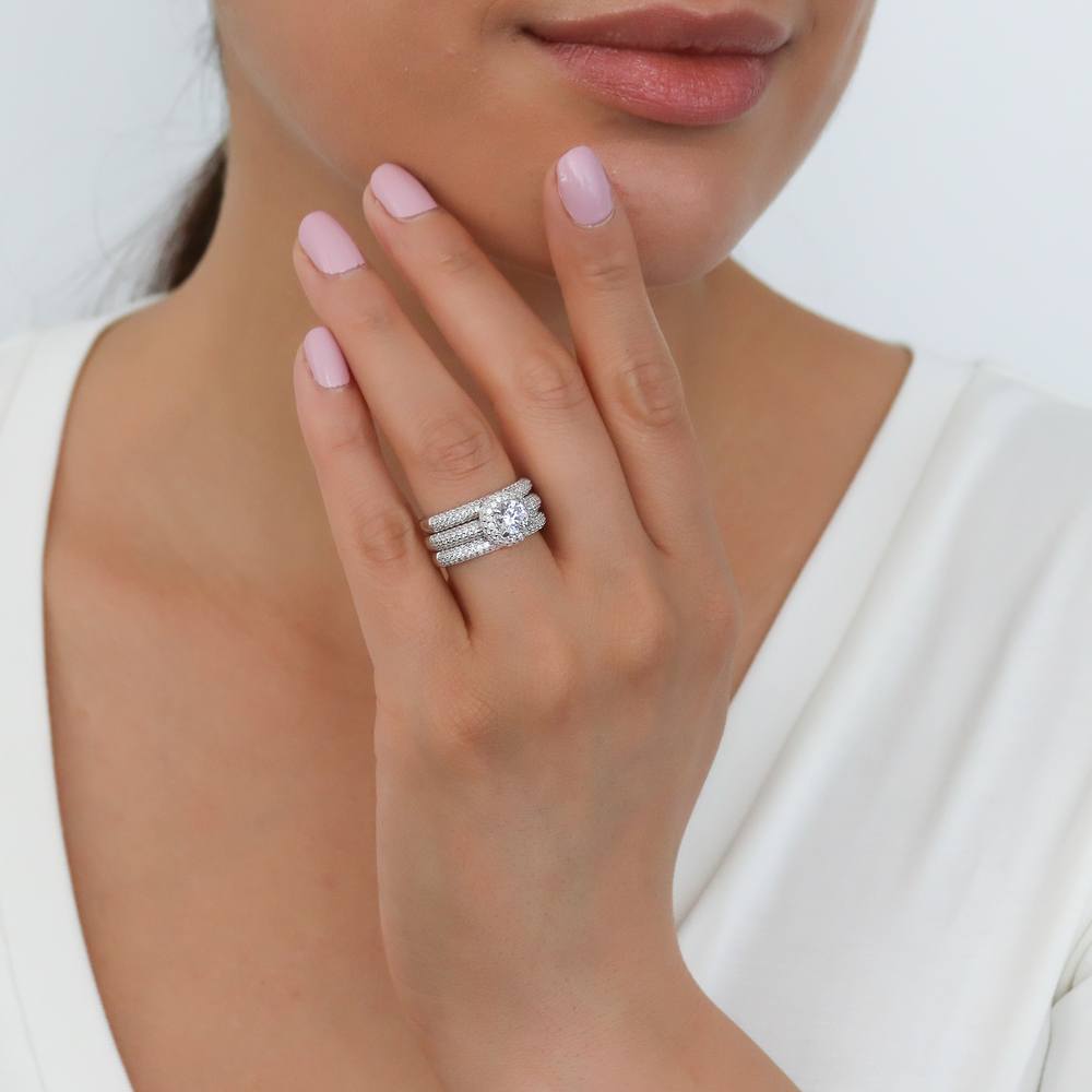 Model wearing Pave CZ Eternity Ring in Sterling Silver, 16 of 19