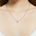 Model wearing Kaleidoscope Solitaire 0.8ct CZ Necklace in Sterling Silver, Purple Aqua Color