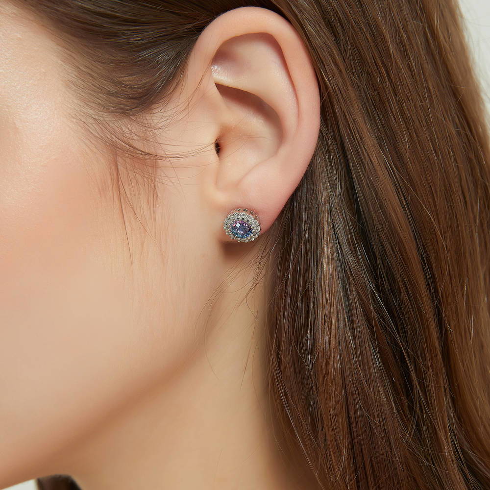 Model wearing Halo Kaleidoscope CZ Stud Earrings in Sterling Silver, Purple Aqua