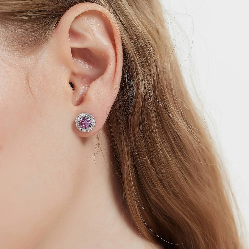 Model wearing Halo Kaleidoscope CZ Stud Earrings in Sterling Silver, Purple
