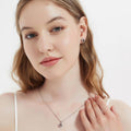 Model wearing Halo Kaleidoscope CZ Stud Earrings in Sterling Silver, Caramel