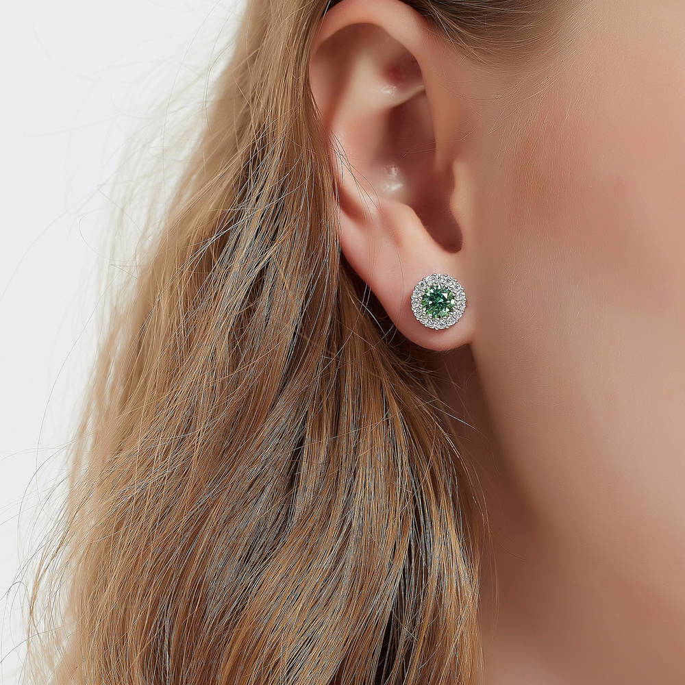 Model wearing Halo Kaleidoscope CZ Stud Earrings in Sterling Silver, Green