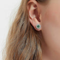 Model wearing Halo Kaleidoscope CZ Stud Earrings in Sterling Silver, Green