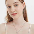 Model wearing Solitaire 3ct Asscher CZ Necklace in Sterling Silver, Rhodium Plated
