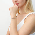 Model wearing Bar CZ Tennis Bracelet in Sterling Silver, Rhodium Plated