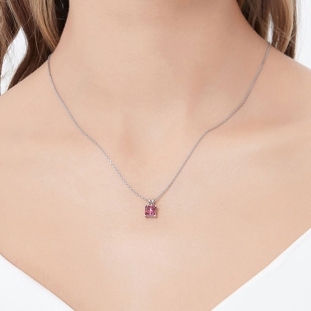 Model wearing Solitaire CZ Necklace in Sterling Silver, Princess Cut / Clear