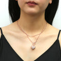 Model wearing Heart Checkerboard Toggle Pendant Necklace, Rose Gold Flashed